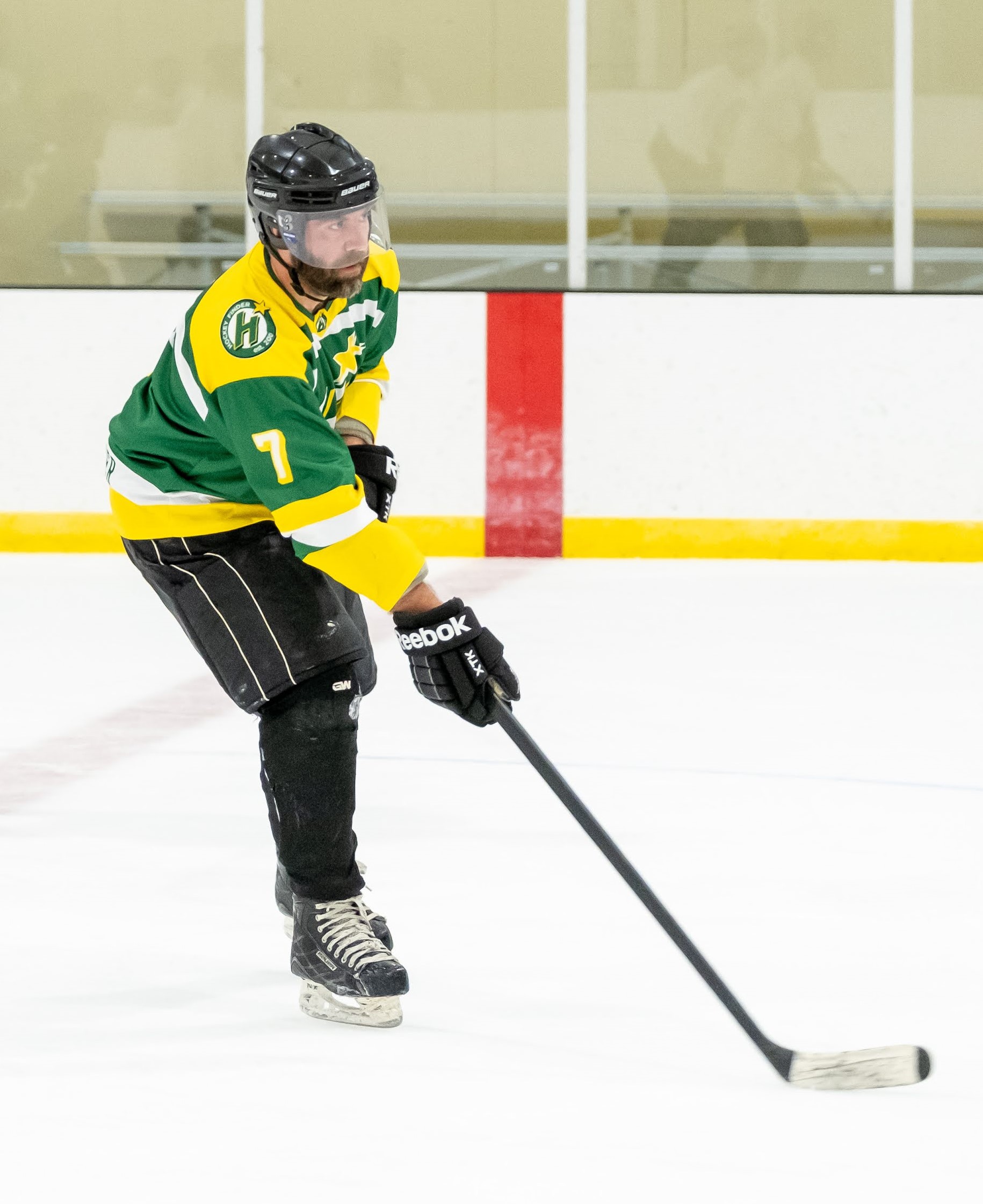 Hockey player in action on ice rink